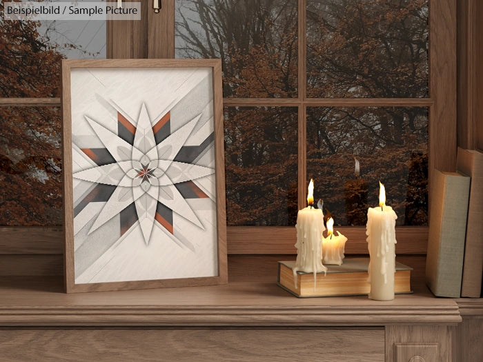 Framed geometric artwork next to lit candles on window ledge, autumn trees visible outside.