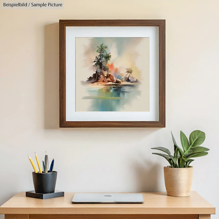 Framed watercolor painting of tropical island on wall above desk with plant and pencils.