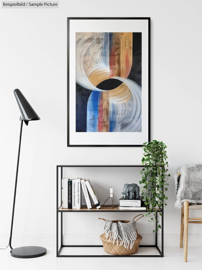 Modern living room with abstract art, black lamp, books, plant, and wicker basket on a metal and wood console.