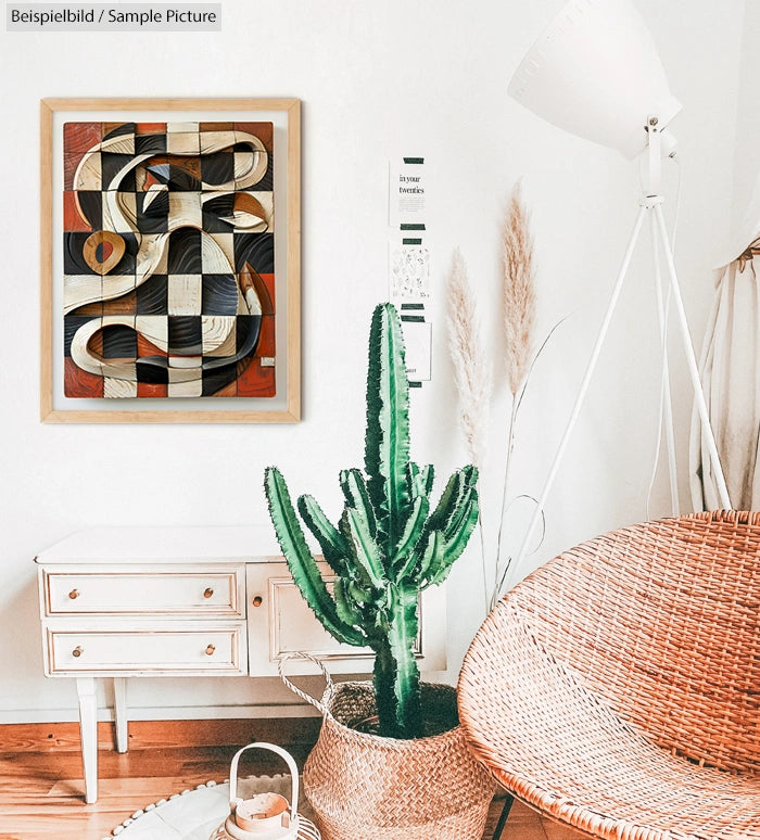 Stylish living room with cactus, wicker chair, and abstract wall art featuring swirling shapes in black, white, and red.