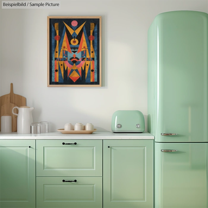 Retro mint-green kitchen with vintage fridge, abstract art, and wooden accents on counter.