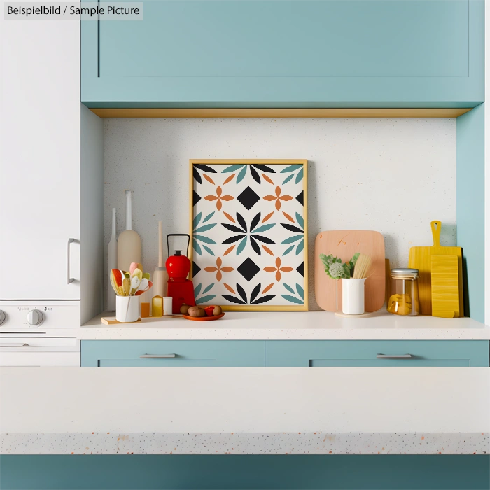 Modern kitchen with teal cabinets, colorful abstract art, and various kitchen utensils on a white countertop.