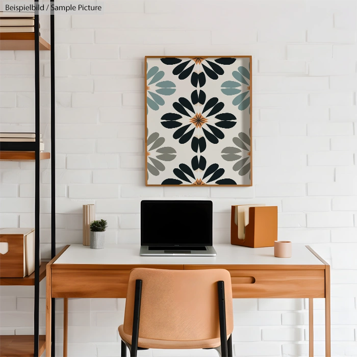 Modern workspace with wooden desk, laptop, chair, and abstract floral artwork on white brick wall.