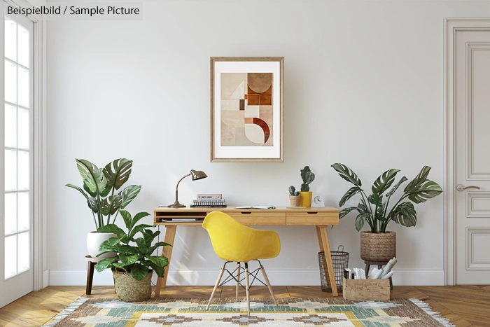 Modern home office with wooden desk, yellow chair, potted plants, and geometric art on the wall.