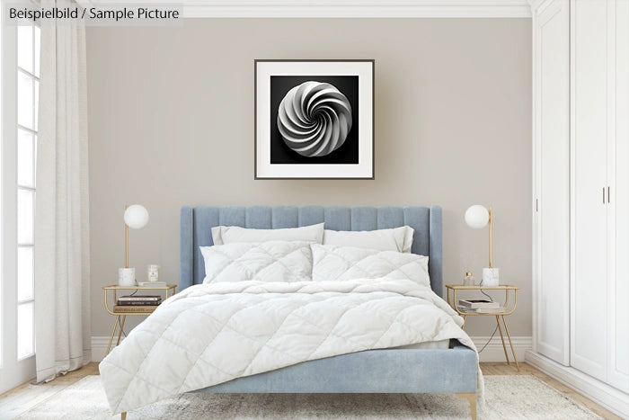 Modern bedroom with light blue bed, white bedding, and abstract black and white swirl art on beige wall.