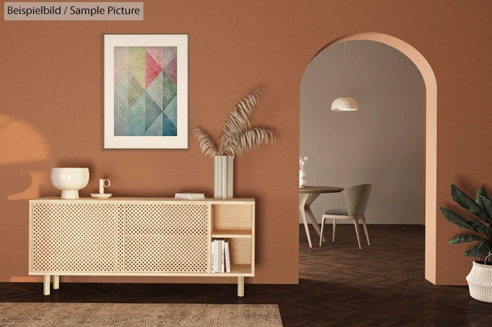 Modern living room with a wicker cabinet, abstract wall art, pampas grass, and a view of a dining area through an archway.