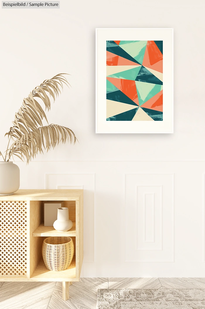 Minimalist room with a geometric abstract painting featuring orange, teal, and beige triangles, on a white wall.