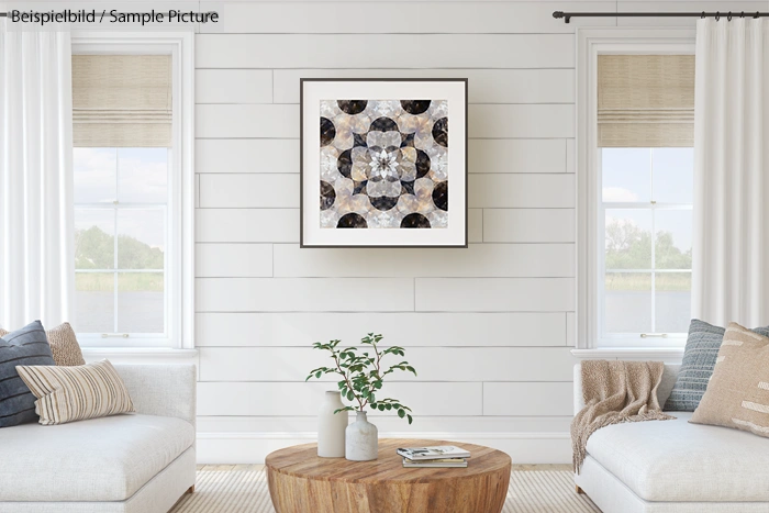 Cozy living room with a patterned wall art, two beige couches, round wooden table, and potted plant.