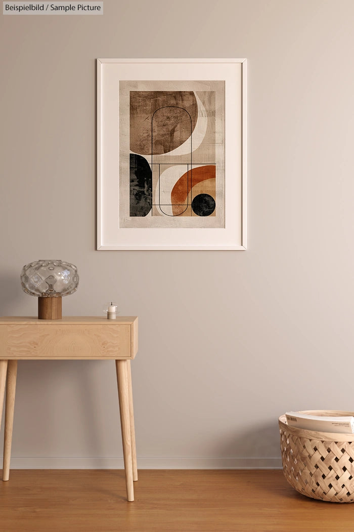 Minimalist room with abstract art on wall, wooden table with glass lamp, and woven basket on floor.