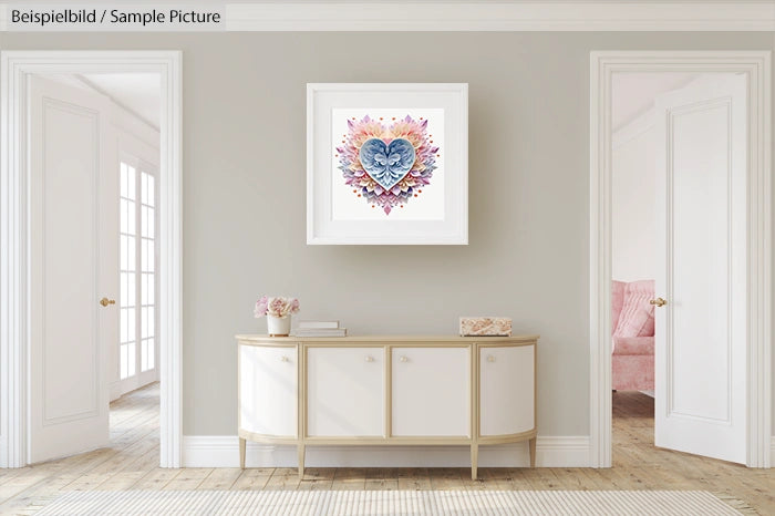 Modern living room with a heart-shaped abstract artwork on the wall, white sideboard, and neutral decor.