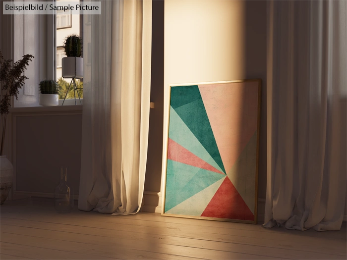 Abstract geometric painting in sunlit room, leaning against beige wall with curtains.