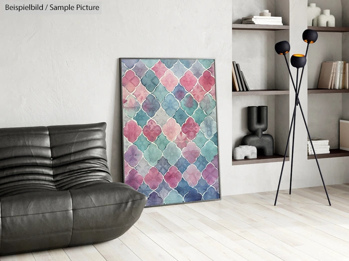 Modern living room with geometric patterned artwork, black sofa, and minimalist floor lamp.