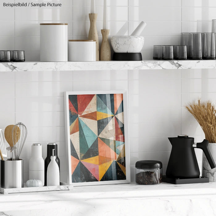 Modern kitchen shelf with geometric abstract painting and assorted kitchenware in a minimalist setting.