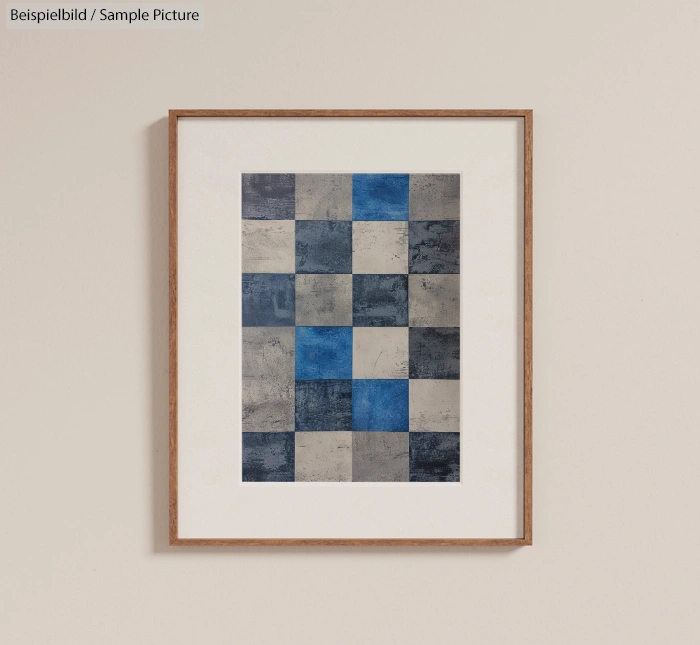 Framed abstract art with a checkerboard pattern of blue, gray, and beige squares on a white background.