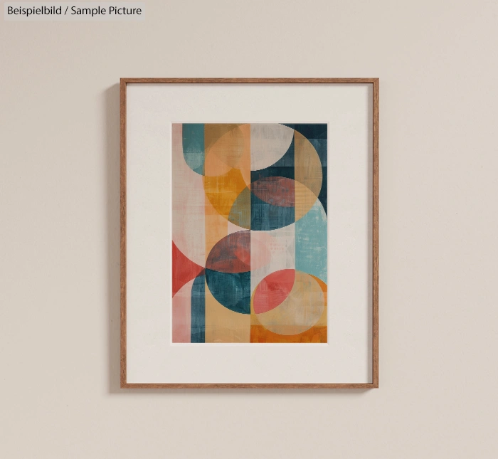 Abstract geometric artwork with overlapping circles in earthy tones, framed and hung on a beige wall.