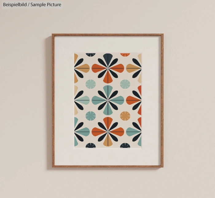 Framed artwork with colorful floral geometric pattern on a neutral wall.