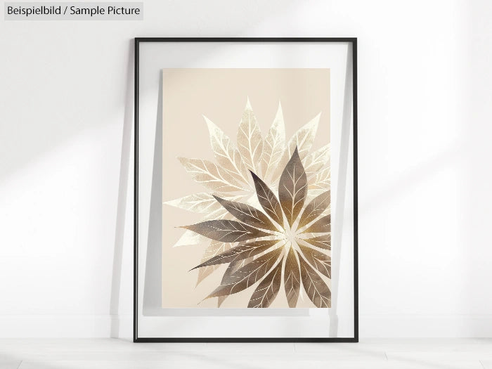 Framed abstract artwork with leaves in beige and brown hues displayed against a white wall.