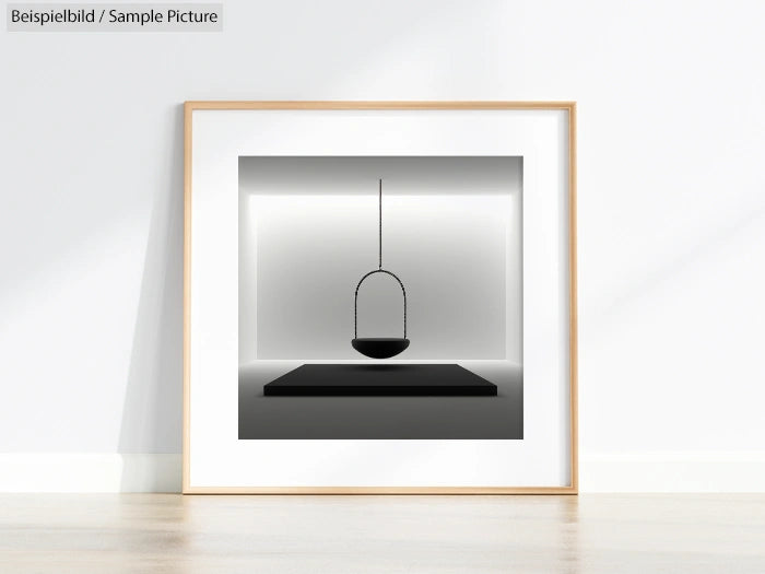 Minimalist framed art of a black chair suspended in a gray-lit room, leaning against a white wall.