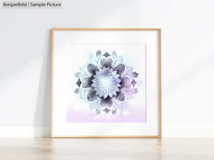 Framed artwork featuring an abstract floral mandala design with soft gray and lavender hues against a light background.