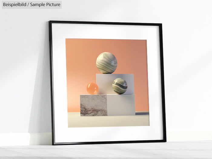 Framed abstract art with geometric shapes and spheres on a peach background, leaning against a white wall.