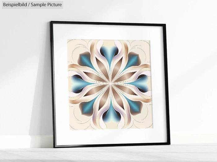 Framed abstract artwork with symmetrical flower-like pattern in blue, beige, and cream colors, leaning against a wall.