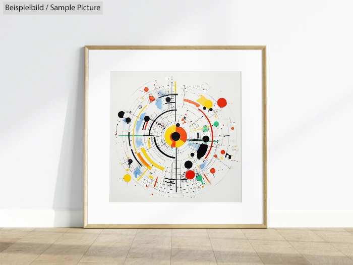 Framed abstract art with colorful geometric circles and lines against a light background, hung on a white wall.