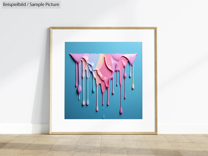 Framed abstract artwork with colorful paint drips on a blue background, displayed in a gallery-like setting.