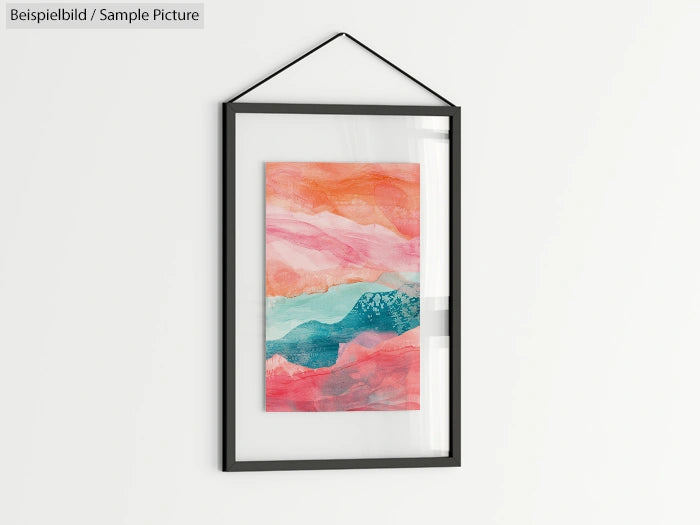 Framed abstract painting with pink, orange, and turquoise layers on a white wall.