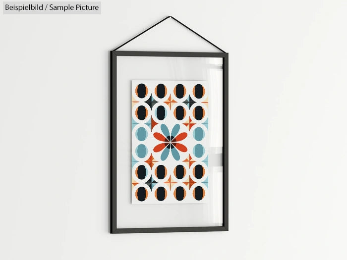 Framed abstract artwork with geometric shapes and floral pattern in blue, orange, and black.