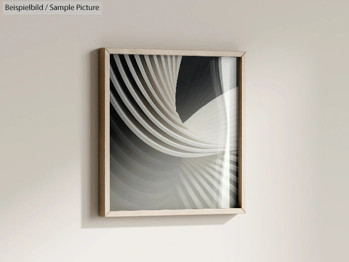 Framed abstract art with curved white and gray lines on a neutral wall.