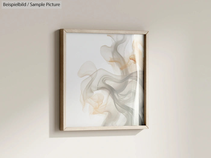 Framed abstract artwork with fluid gray and beige swirls on a white background, hanging on a light-colored wall.