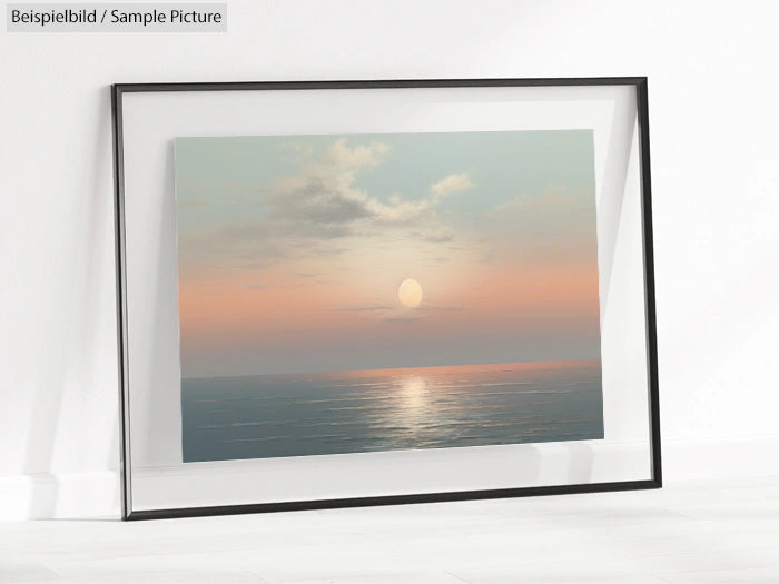 Framed picture of a serene ocean sunset with soft clouds in a minimalist setting.