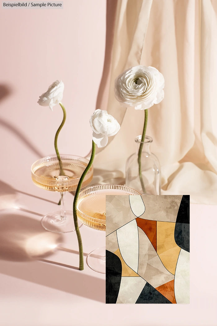 Elegant still life with white flowers in vases, two champagne glasses, and abstract geometric art on a soft pink backdrop.