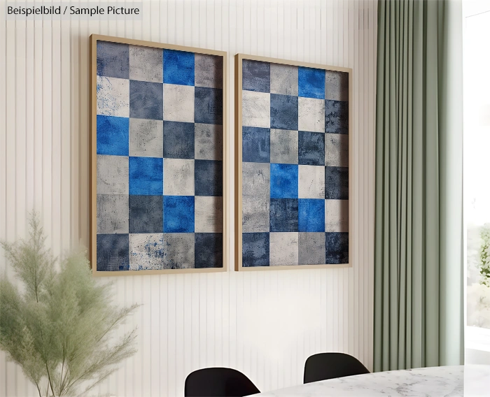 Room with checkerboard blue and gray paintings on the wall, next to a round marble table and black chair.