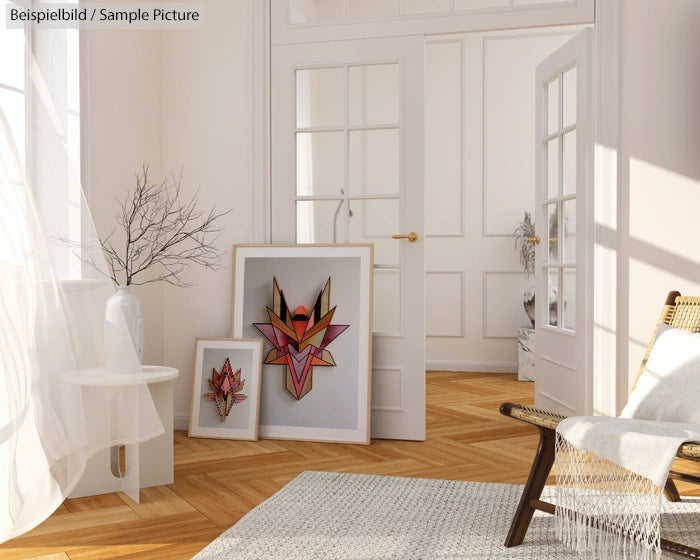 Bright interior with modern art on the floor, wicker chair, and wooden flooring. Light streaming through doorway.