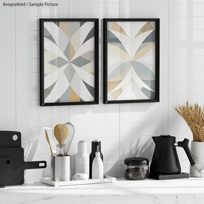 Modern kitchen counter with abstract art, utensils, black kettle, and white tiled backsplash.