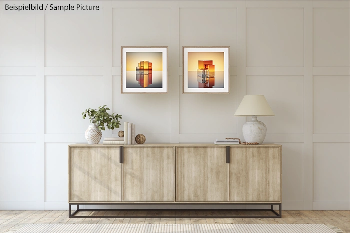 Modern living room with wooden sideboard, decorative vase, and two abstract art pieces on the wall.