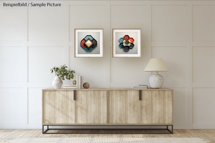 Modern living room with a wooden sideboard, two abstract geometric artworks, and a lamp on top.