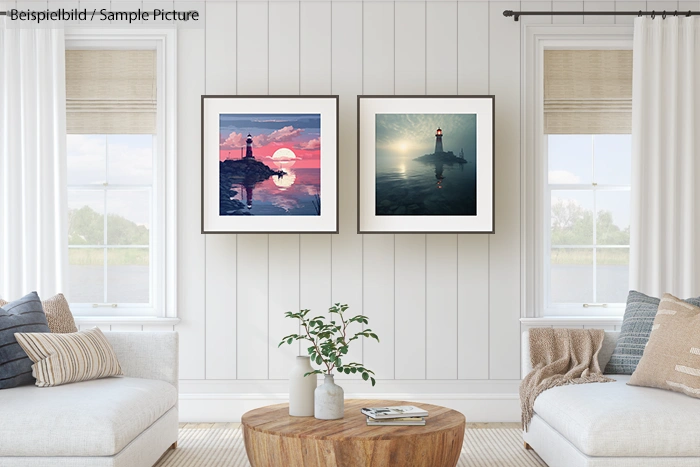 Modern living room with two framed lighthouse artworks on a white wall, flanked by two windows with light curtains.