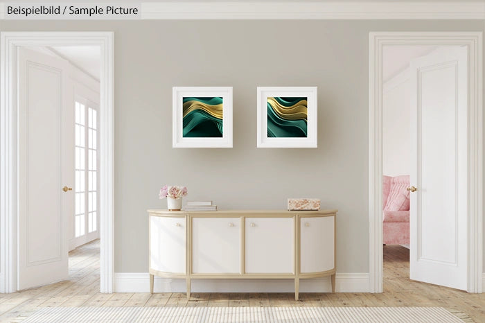 Sleek hallway with two abstract green and gold artworks, white console table, and soft pink armchair in the background.