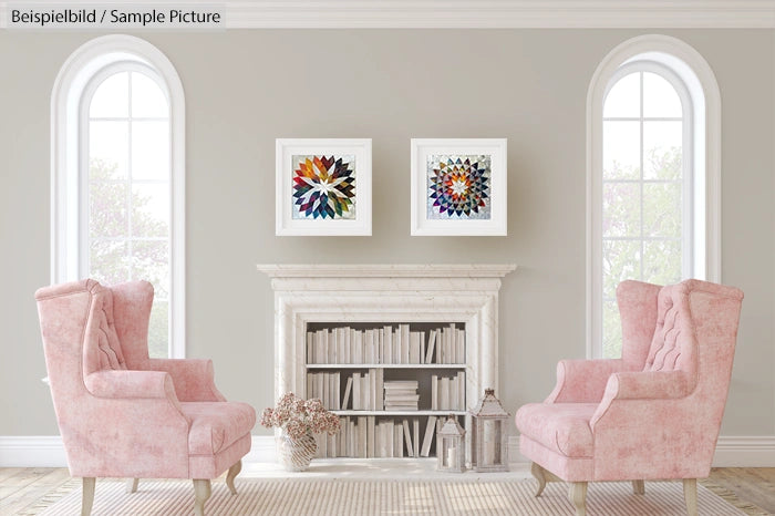 Elegant living room with two pink armchairs, a white fireplace, and colorful abstract art on the walls.