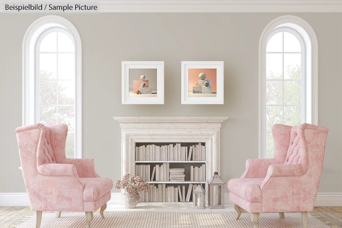 Elegant living room with pink armchairs, a white fireplace, bookshelves, and framed art on a light gray wall.