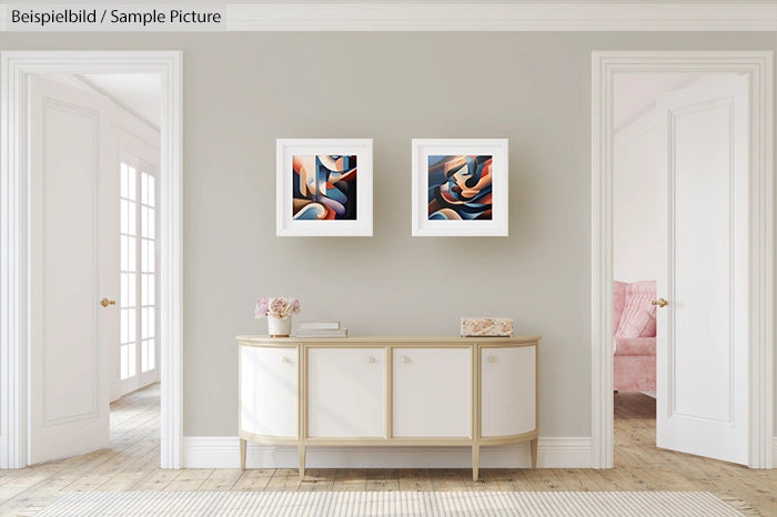 Modern interior with abstract art, sideboard, and soft pink accents in adjacent room.