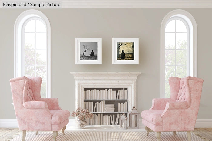 Elegant living room with pink armchairs, white bookshelf, and two framed artworks on a light gray wall.