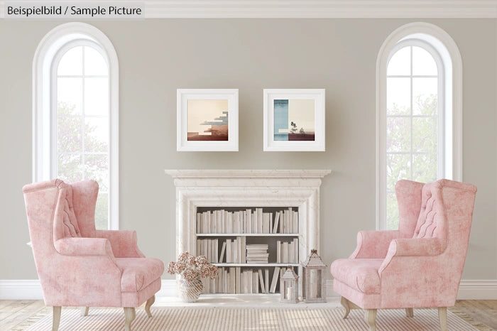 Elegant living room with pink armchairs, white fireplace, and framed art on a light gray wall.