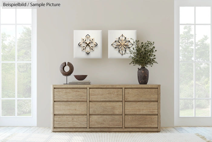 Modern living room with wooden dresser and abstract art on walls.