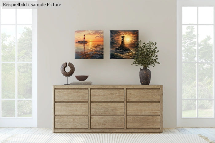 Modern room with wooden dresser, two lighthouse paintings, and decorative items against a bright windowed wall.