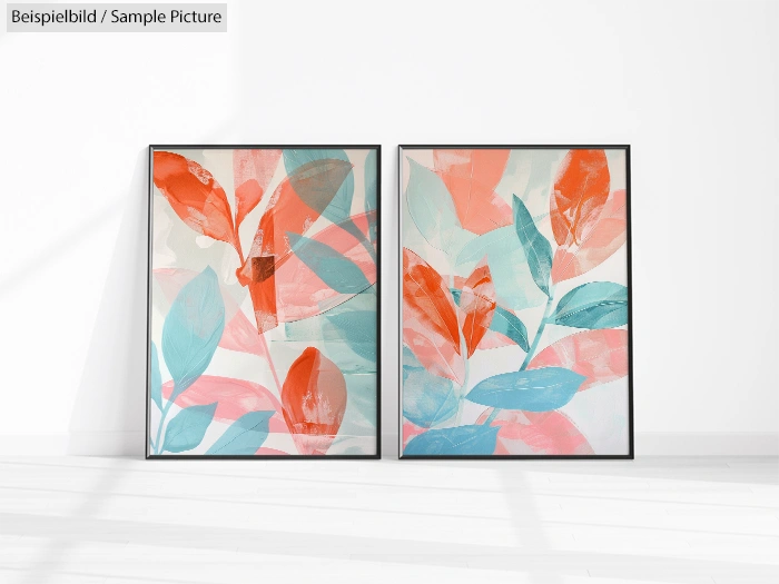 Two framed abstract leaf paintings with orange, pink, and teal colors on a white background.