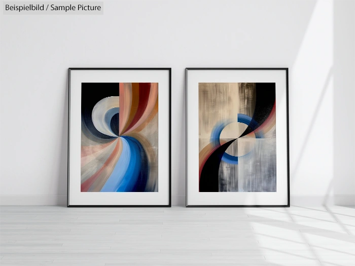 Two framed abstract paintings with swirling blue, brown, and beige patterns on a white wall in a bright room.