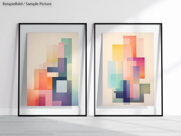 Two framed abstract artworks with colorful geometric shapes in a modern minimalist room.